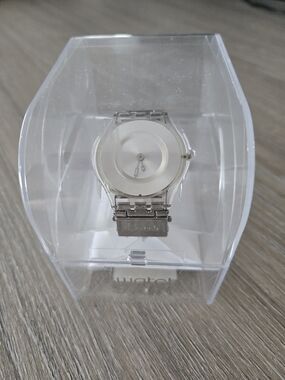 Swatch SKIN Silver Clear Transparent Dial Stainless Bracelet Watch